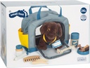 Hund mit Tasche und Pflege-Set